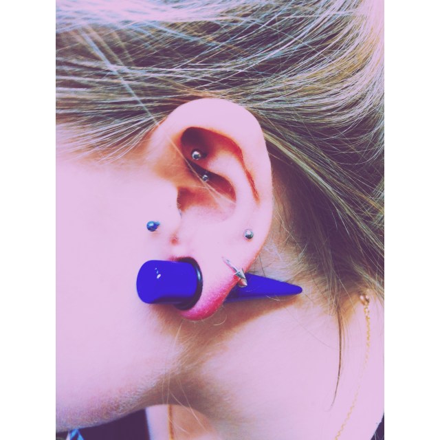 Sophie's Left Ear w/fresh 12mm stretch among other piercings by El Capitan.