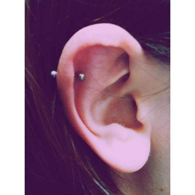 Top Ear Cartilage Rim Piercing