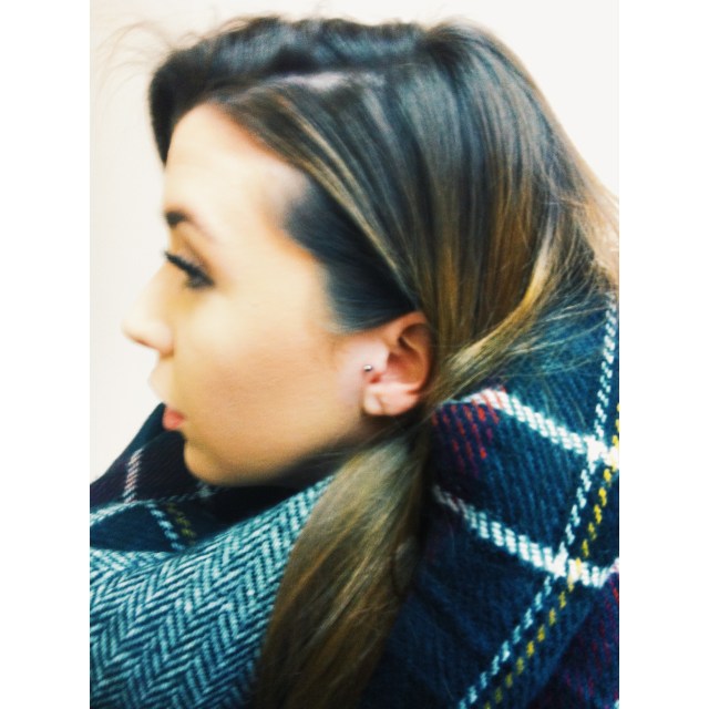 Jess' Tragus Piercing