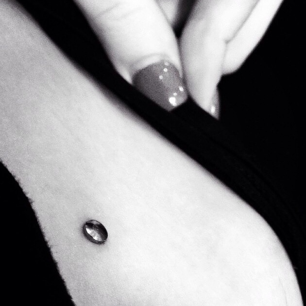 Hip Dermal Piercing by El Capitan