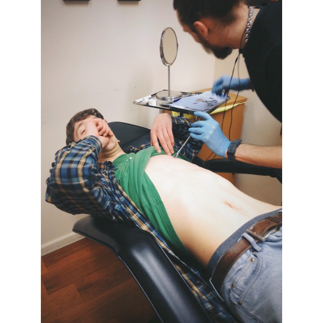 El Cap piercing George's nipple...