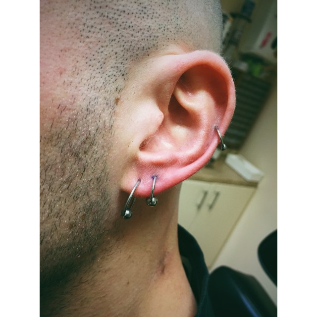 Sam's Lobe Piercings