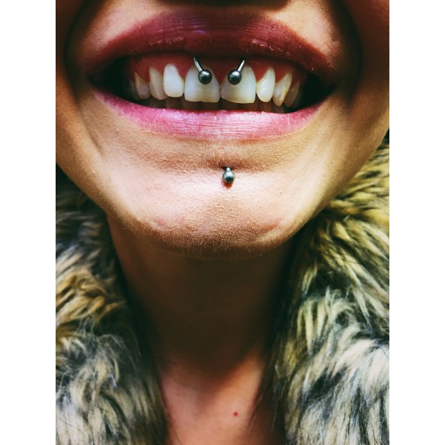 Sam's Smiley Piercing
