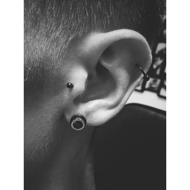 Oscar's Piercings - Ear Werk by El Capitan